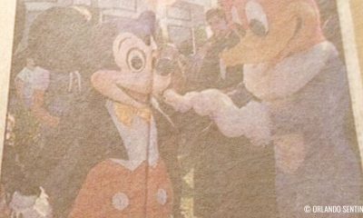 Woody Woodpecker from Universal Studios Delivers Gift to Mickey Mouse at Walt Disney World