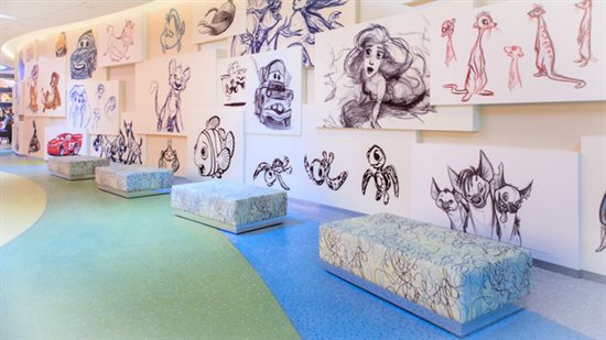 The lobby of Disney's Art of Animation hotel lobby is filled with drawings of aniimated characters