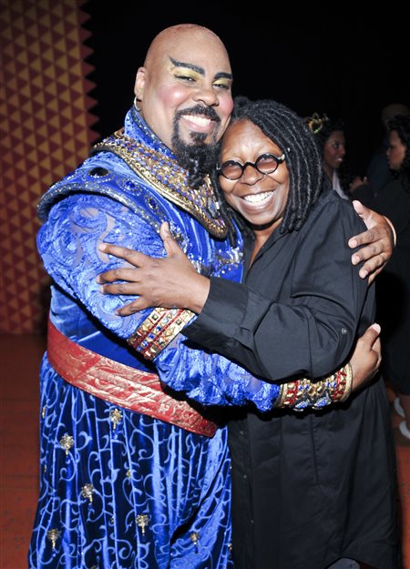 James Monroe Iglehart and Whoopi Goldberg hug it out backstage at Disney's newest Broadway hit Aladdin
